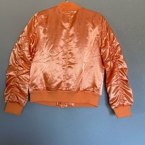 An orange puff jacket